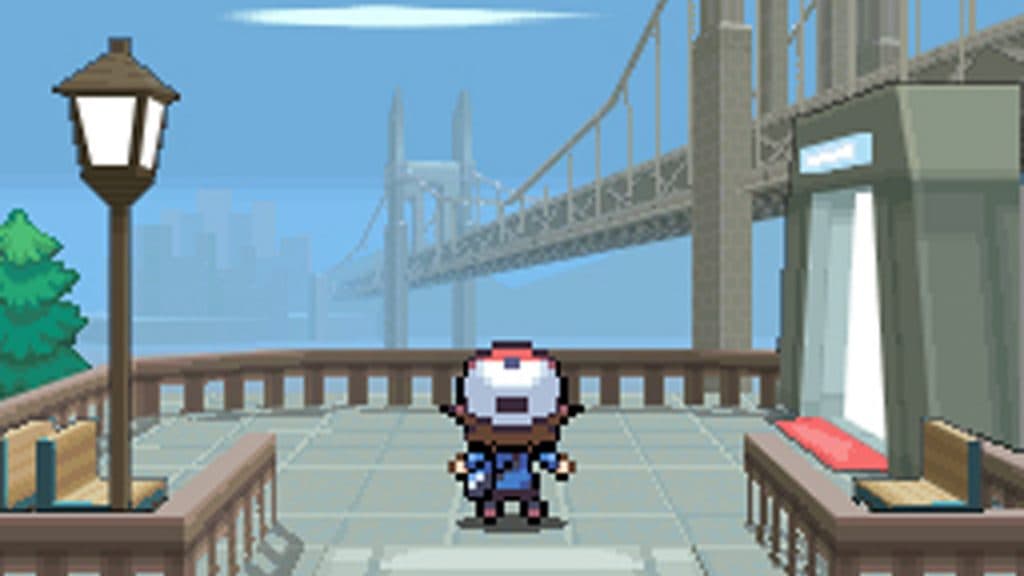 Personnage Pokémon noir et blanc regardant un pont.